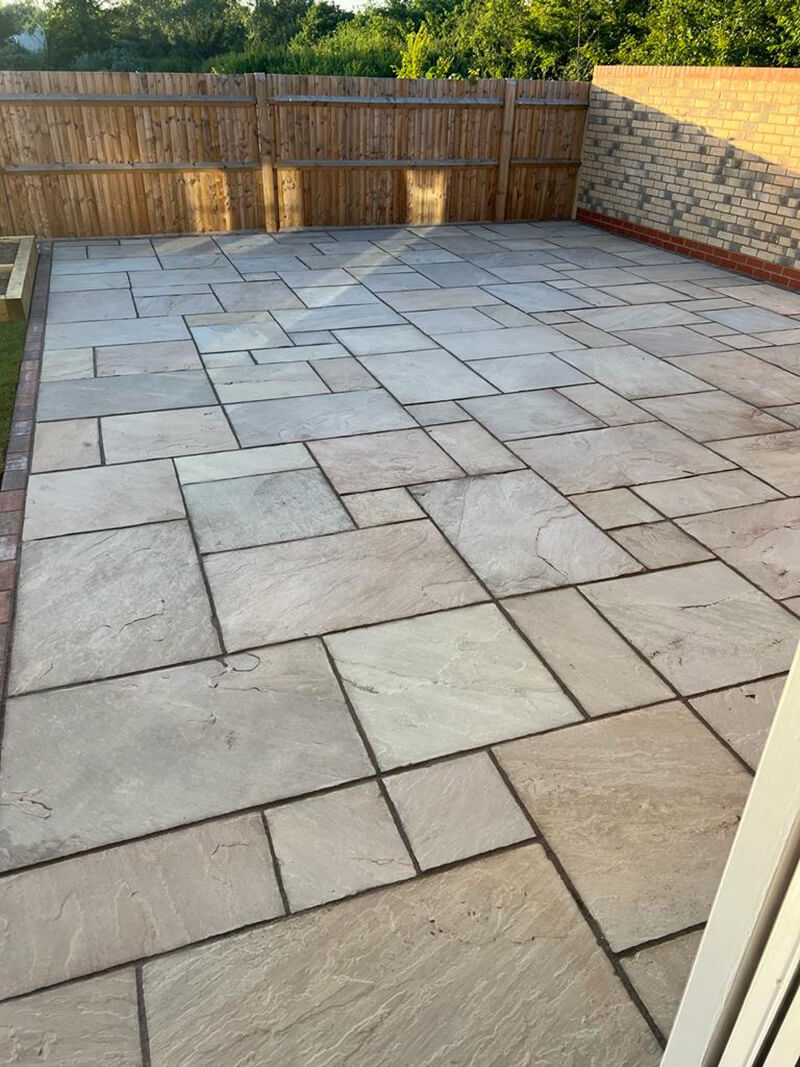 Indian Sandstone With Black Paving Edges and New Turf - Canterbury, Kent