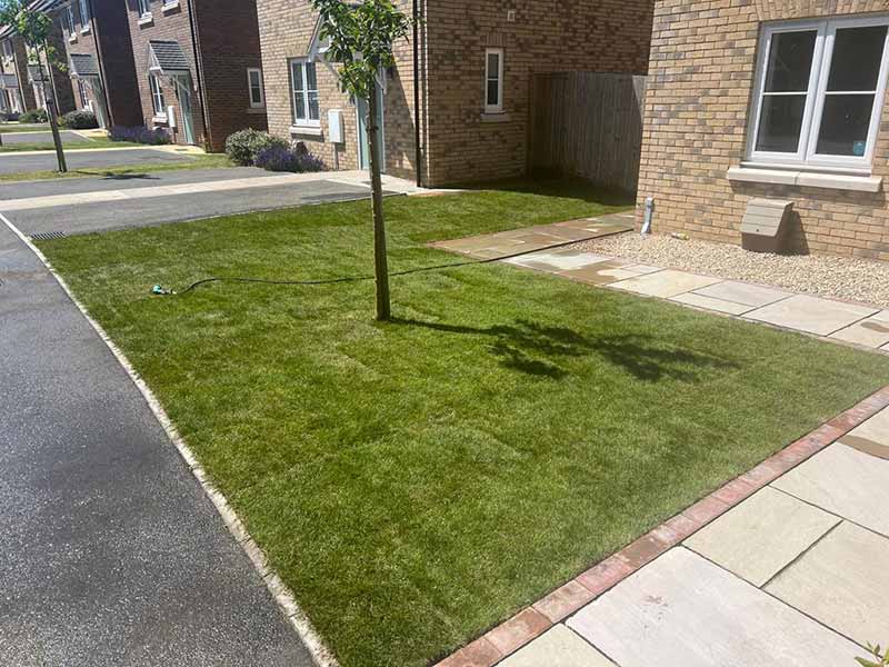 Indian Sandstone With Black Paving Edges and New Turf - Canterbury, Kent