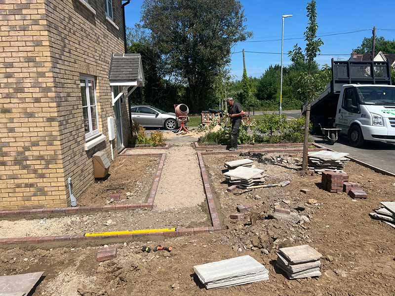 Indian Sandstone With Black Paving Edges and New Turf - Canterbury, Kent